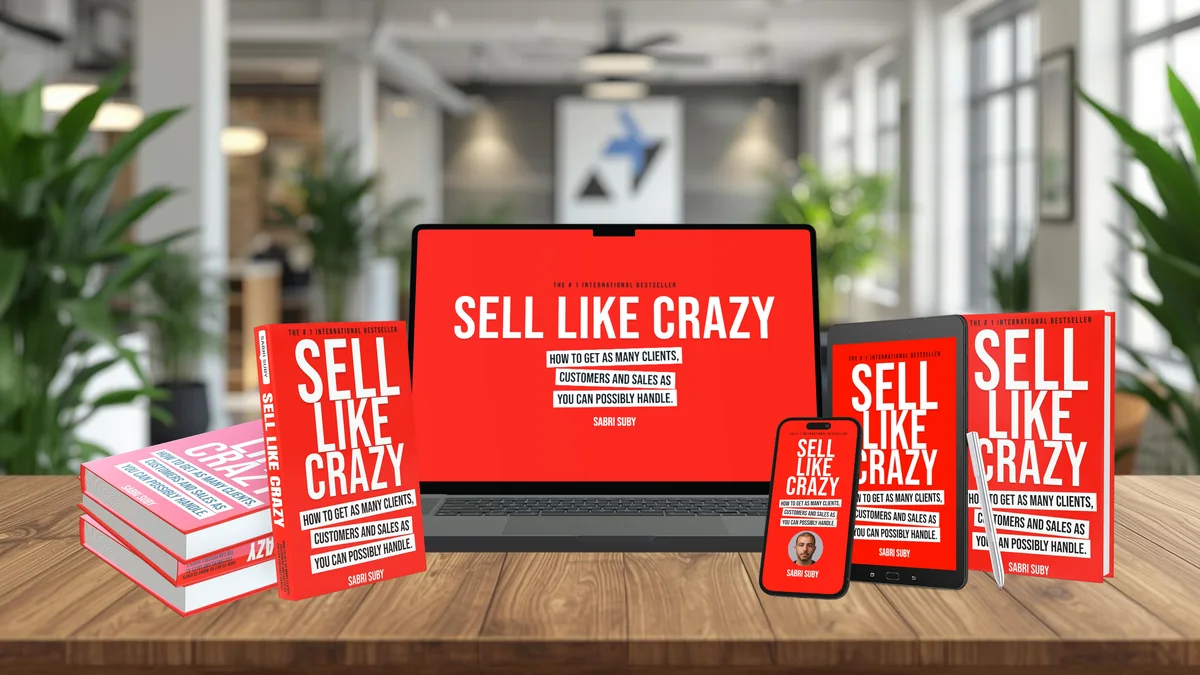 The Sell Like Crazy bundle on a desk in a real office